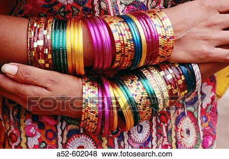 Bangles on ethnic tribal's hands. India View Large Photo Image Stock Photo - Bangles on ethnic tribal's hands. India. Fotosearch