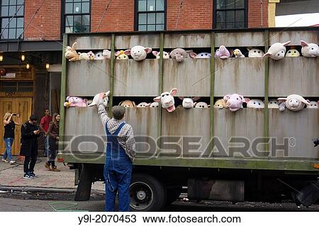 Stock Image - Banksy enthusiasts flock to the trendy Meatpacking District in New York on Friday, October 11, 2013 to see the eleventh installment of Banksy's art,??The Sirens of the Lambs??.. Fotosearch
