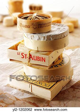 Stock Image - Banon, Camembert, St Aubin, Livorat and Pontleveque French traditional regonal Cheeses. Fotosearch