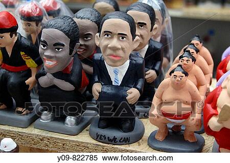 Barack Obama as a? caganer? (particular feature of modern Catalan nativity scenes) View Large Photo Image Stock Photography - Barack Obama as a? caganer? (particular feature of modern Catalan nativity scenes). Fotosearch