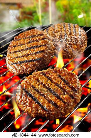 Barbecue burgers on a BBQ grill View Large Photo Image Picture - Barbecue burgers on a BBQ grill. Fotosearch