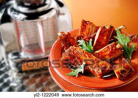 Stock Photo - Barbecue spare ribs in an American diner. Fotosearch