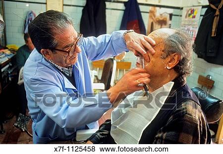 barbershop Juan Trueno working In plaza Salvador Albaic? n quarter Granada, Andalucia, Spain View Large Photo Image Stock Photo - barbershop Juan Trueno working In plaza Salvador Albaic? n quarter Granada, Andalucia, Spain. Fotosearch