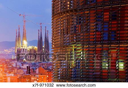 Barcelona: At right Agbar Tower 142 m by Jean Nouvel At left Sagrada Familia View Large Photo Image Stock Image - Barcelona: At right Agbar Tower 142 m by Jean Nouvel At left Sagrada Familia. Fotosearch