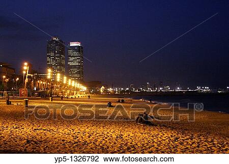 Barcelona Beach at night Villa Olimpica in the background View Large Photo Image Stock Image - Barcelona Beach at night Villa Olimpica in the background. Fotosearch
