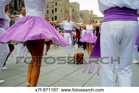 Stock Photo - Barcelona: `Sardanes? traditional Catalan dance, in Catedral Avenue during La Merce Festival. Fotosearch