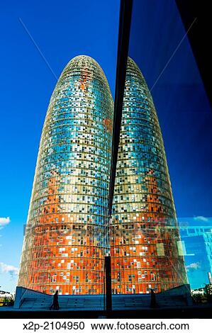 Stock Image - BARCELONA, SPAIN: Torre Agbar in the Poblenou neighborhood in Barcelona, Spain. Owned by the Agbar Group, it is a 38-story skyscraper / tower and a famous landmark of the city.. Fotosearch