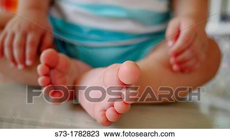 Stock Image - Bare feet. Fotosearch