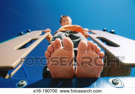 Barefoot boy on playground View Large Photo Image Stock Image - Barefoot boy on playground. Fotosearch