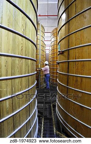 Stock Image - barrels in Courtyard at La Perseverancia, Tequila Sauza's distillery.. Fotosearch