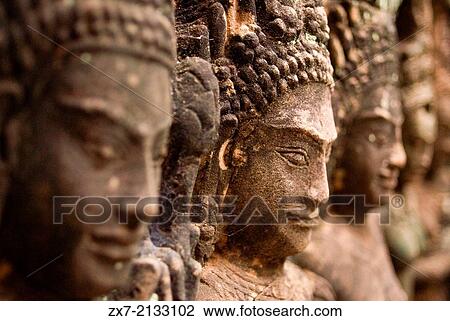 Bas-relief on the terrace of Leper King. Angkor Thom. The Terrace of the Leper King (or Leper King Terrace), (Preah Learn Sdech Kunlung) is located in the northwest corner of the Royal Square of Angkor Thom, Cambodia. View Large Photo Image Stock Image - Bas-relief on the terrace of Leper King. Angkor Thom. The Terrace of the Leper King (or Leper King Terrace), (Preah Learn Sdech Kunlung) is located in the northwest corner of the Royal Square of Angkor Thom, Cambodia.. Fotosearch