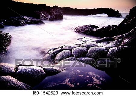 Basalt rock at sea side,? Charco Azul?, El Hierro, Canary Islands, Spain View Large Photo Image Stock Photo - Basalt rock at sea side,? Charco Azul?, El Hierro, Canary Islands, Spain. Fotosearch