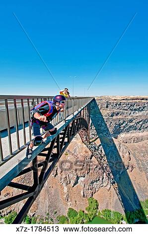 BASE Jumping the Perrine Memorial Bridge over the Snake River Canyon near the city of Twin Falls in southern Idaho View Large Photo Image Stock Image - BASE Jumping the Perrine Memorial Bridge over the Snake River Canyon near the city of Twin Falls in southern Idaho. Fotosearch