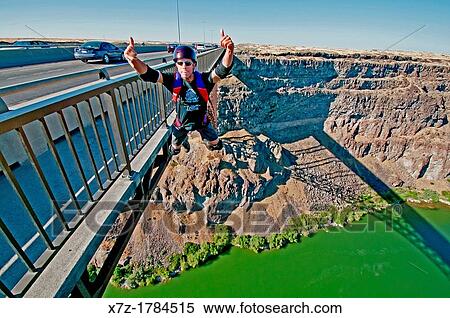 BASE Jumping the Perrine Memorial Bridge over the Snake River Canyon near the city of Twin Falls in southern Idaho View Large Photo Image Stock Photography - BASE Jumping the Perrine Memorial Bridge over the Snake River Canyon near the city of Twin Falls in southern Idaho. Fotosearch