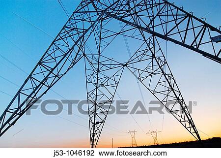 Base of powerline tower, high voltage electricity transmission lines at dusk, Northwestern Arizona near Hoover Dam View Large Photo Image Stock Image - Base of powerline tower, high voltage electricity transmission lines at dusk, Northwestern Arizona near Hoover Dam. Fotosearch