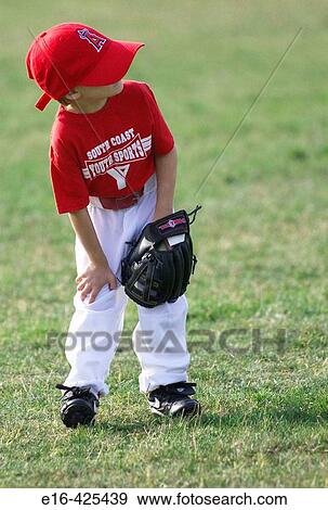 Baseball boy in the field View Large Photo Image Stock Photo - Baseball boy in the field. Fotosearch