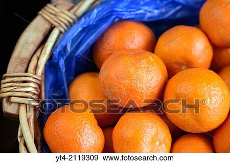 Stock Photo - Basket of Fresh Mediterranean Mandarins, Crete, Greece.. Fotosearch