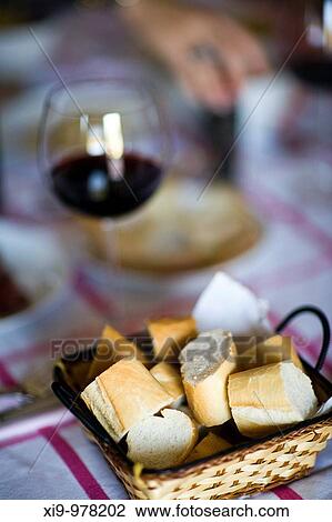 Basket with sliced bread on a table, Seville, Spain View Large Photo Image Stock Image - Basket with sliced bread on a table, Seville, Spain. Fotosearch