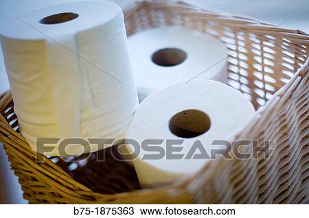 basket with three rolls of toilet paper View Large Photo Image Stock Image - basket with three rolls of toilet paper. Fotosearch