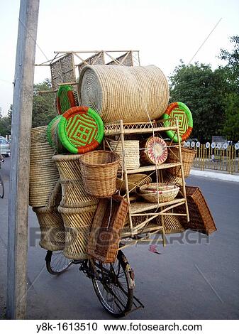 Basketwork shop on cycle in Defence Colony, New Delhi, India View Large Photo Image Stock Image - Basketwork shop on cycle in Defence Colony, New Delhi, India. Fotosearch