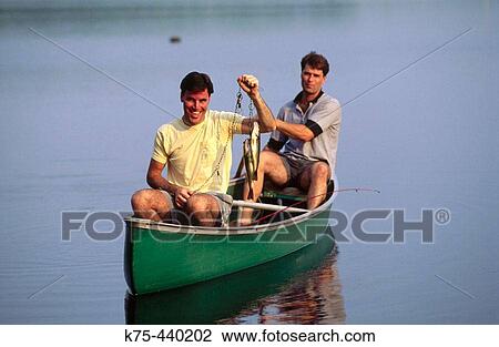 Bass fishing from a canoe View Large Photo Image Stock Image - Bass fishing from a canoe. Fotosearch