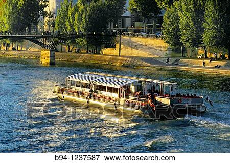 Stock Photo - Bateau-mouche, Seine river boats. Paris, France.. Fotosearch