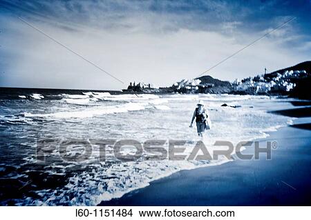Picture - Bath in the beach, Cabo de Gata, Almeria province, Andalucia, Spain. Fotosearch