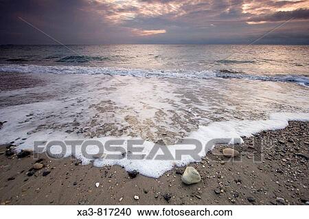 Beach at sunrise, Almeria province, Andalusia, Spain View Large Photo Image Stock Image - Beach at sunrise, Almeria province, Andalusia, Spain. Fotosearch