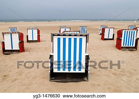 Stock Image - Beach chairs are Baltic beach, Mecklenburg-Vorpommern, Germany. Fotosearch