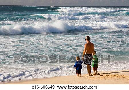 Beach father and kids View Large Photo Image Stock Photo - Beach father and kids. Fotosearch