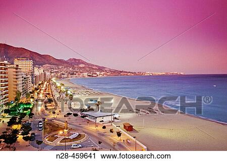 Beach front and promenade in the evening, Fuengirola. MBlaga province, Costa del Sol. Andalusia, Spain View Large Photo Image Stock Image - Beach front and promenade in the evening, Fuengirola. MBlaga province, Costa del Sol. Andalusia, Spain. Fotosearch