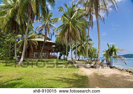 Stock Photography - Beach front house, Carenero Island, Bocas del Toro Province, Panama. Fotosearch