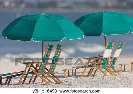 Beach furniture on a sunny day at Fort Myers Beach, Florida, USA View Large Photo Image Stock Photo - Beach furniture on a sunny day at Fort Myers Beach, Florida, USA. Fotosearch