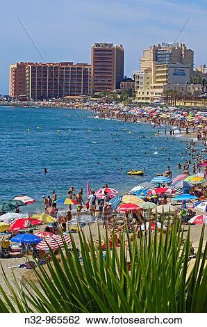 Beach in high season, Benalmadena. Costa del Sol, Malaga province, Andalusia, Spain View Large Photo Image Stock Image - Beach in high season, Benalmadena. Costa del Sol, Malaga province, Andalusia, Spain. Fotosearch