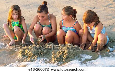 beach kids playing together View Large Photo Image Stock Image - beach kids playing together. Fotosearch