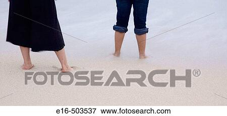 Beach legs View Large Photo Image Stock Photo - Beach legs. Fotosearch