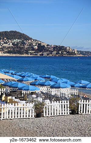 Stock Image - Beach, Nice, Cote d Azur, Alpes Maritimes, Provence, French Riviera, France, Europe. Fotosearch