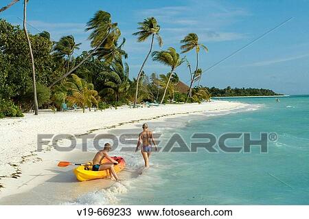 Stock Image - Beach on Resort Island, Maldives, Indian Ocean. Fotosearch