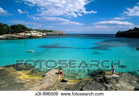 Beach or Cala Turqueta Minorca Balearic islands Spain View Large Photo Image Stock Photo - Beach or Cala Turqueta Minorca Balearic islands Spain. Fotosearch