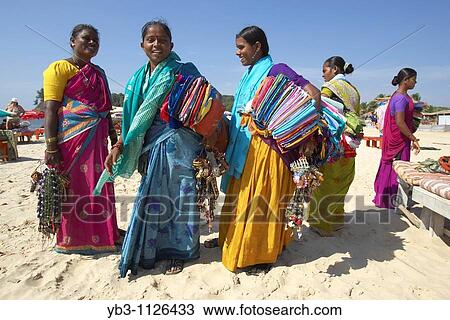 Stock Image - Beach Sellers/Hawkers, Baga/Calangute Beach, Goa, India. Fotosearch