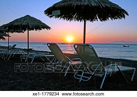 beach, sunrise, Kamari, Santorini, Greece View Large Photo Image Picture - beach, sunrise, Kamari, Santorini, Greece. Fotosearch