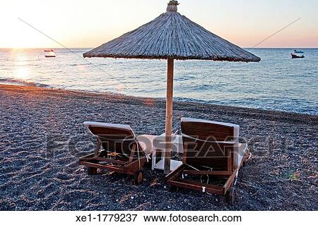 beach, sunrise, Kamari, Santorini, Greece View Large Photo Image Stock Photo - beach, sunrise, Kamari, Santorini, Greece. Fotosearch