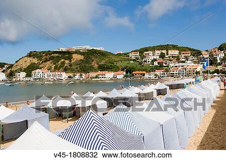 Stock Image - Beach tents, Sao Martinho do Porto, Alcobaca, Oeste, Leiria District, Portugal.. Fotosearch