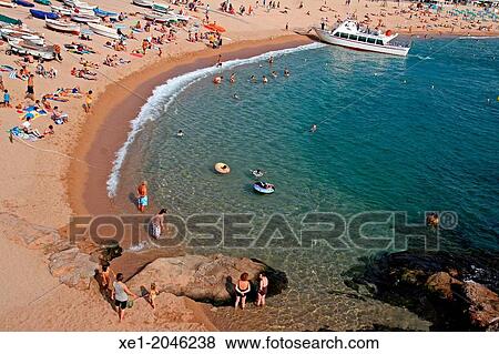 Beach, tourboat, Tossa de Mar, Costa Brava, Catalonia, Spain View Large Photo Image Stock Photo - Beach, tourboat, Tossa de Mar, Costa Brava, Catalonia, Spain. Fotosearch