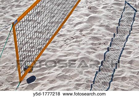 Beach Volley-ball net and ball, beach in Marseille, France, Mediterranean sea beach View Large Photo Image Stock Photo - Beach Volley-ball net and ball, beach in Marseille, France, Mediterranean sea beach. Fotosearch