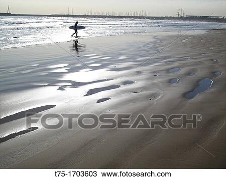 Beach with surfer, View Large Photo Image Stock Image - Beach with surfer,. Fotosearch