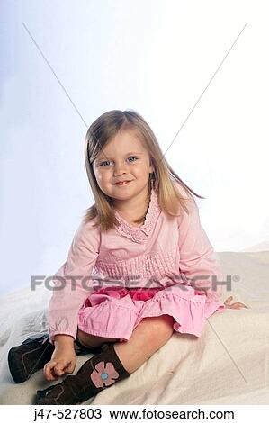beautiful 3 year old girl with blonde hair, smiling into camera, in the studio, sitting on the floor View Large Photo Image Stock Image - beautiful 3 year old girl with blonde hair, smiling into camera, in the studio, sitting on the floor. Fotosearch