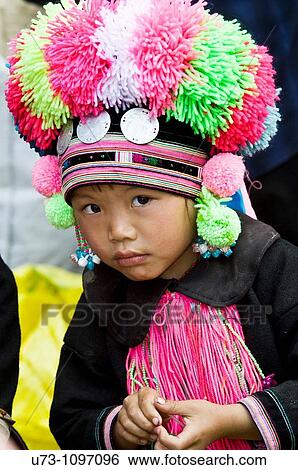 Beautiful and Shy. a cute little Yao girl. View Large Photo Image Stock Photograph - Beautiful and Shy. a cute little Yao girl.. Fotosearch