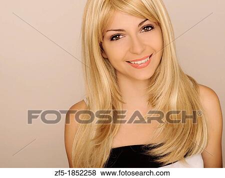 Stock Photo - Beautiful blond girl smiling. Fotosearch