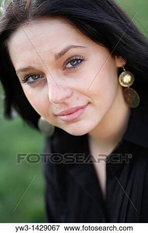 beautiful brunette outdoor portrait on grass View Large Photo Image Stock Photo - beautiful brunette outdoor portrait on grass. Fotosearch